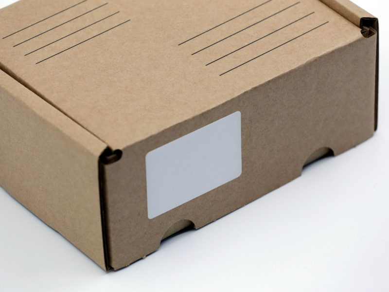 brown cardboard box on white table