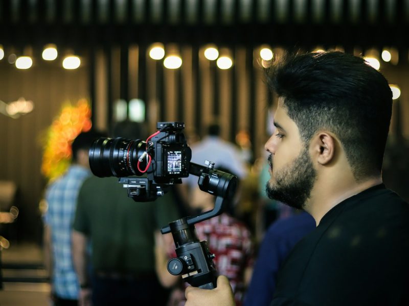 a man holding a camera